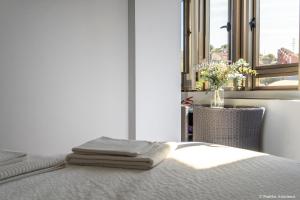 A bed or beds in a room at Apartamento - Riba De Sella