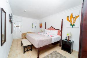 Rúm í herbergi á Franklyn D Resort & Spa All Inclusive