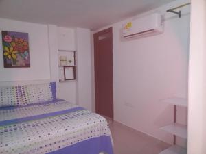 Llit o llits en una habitació de Edificio Don Ramon