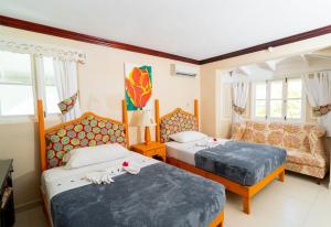 Rúm í herbergi á Franklyn D Resort & Spa All Inclusive