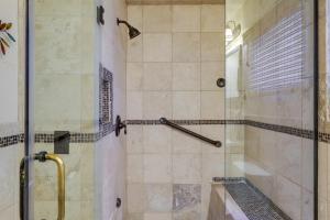 a bathroom with a shower with a glass door at Family-Friendly Utah Home Deck, Mountain Views! in Vernal