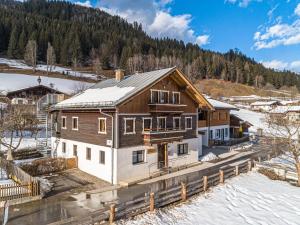 an image of a house in the snow at Kitzbüheler Alpen L in Bramberg am Wildkogel