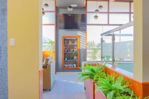 a restaurant lobby with a view of a pool at Hotel San Lorenzo in Moquegua