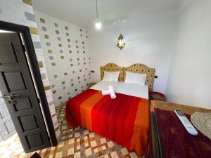 Voodi või voodid majutusasutuse Sun Hostel toas