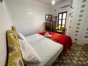 Voodi või voodid majutusasutuse Sun Hostel toas