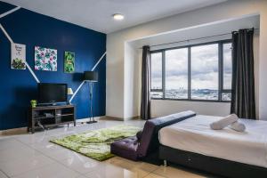 a bedroom with a large bed and a large window at Damen Subang by Widebed in Subang Jaya +218 photos
