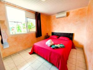 Voodi või voodid majutusasutuse TAHITI - Lihei Pool House toas