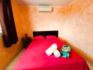Voodi või voodid majutusasutuse TAHITI - Lihei Pool House toas