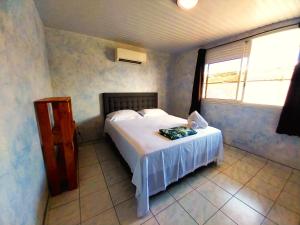 Posteľ alebo postele v izbe v ubytovaní TAHITI - Lihei Pool House