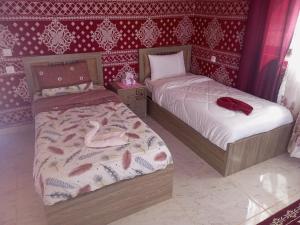 Postel nebo postele na pokoji v ubytování جولات جيب وادي رم
