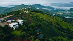an aerial view of a house on a mountain at Phu Phop Kham in Ban Huai Khai