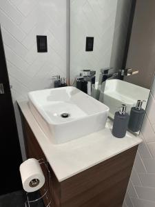 Een badkamer bij Apartamento Delux by M&F