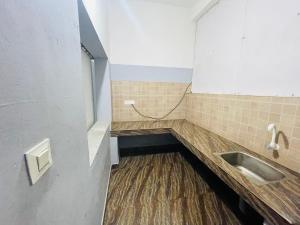 Kúpeľňa v ubytovaní Kottakkal Ayurfidha wellness centre & Dental clinic