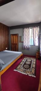 Postel nebo postele na pokoji v ubytování Mountain Chalet