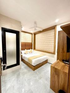 Postel nebo postele na pokoji v ubytování Hotel BKC Prime Near Trade Centre US Embassy, Mumbai