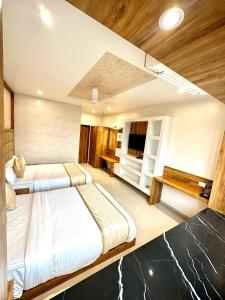 Postel nebo postele na pokoji v ubytování Hotel BKC Prime Near Trade Centre US Embassy, Mumbai