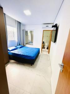 Postel nebo postele na pokoji v ubytování Casa com piscina e hidromassagem praia Enseada.