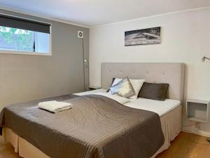 מיטה או מיטות בחדר ב-Unique Nest with Sauna - Central Nr1 by Berti´s