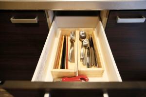 a drawer filled with utensils in a box at Kyokoi Toujimikuni in Kyoto +25 photos