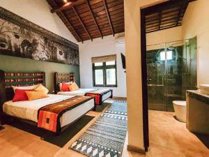 Llit o llits en una habitació de Serendib Signature Resort