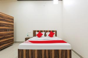 Posteľ alebo postele v izbe v ubytovaní OYO Flagship Hotel Ashirwad