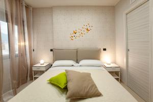 Ένα ή περισσότερα κρεβάτια σε δωμάτιο στο B&B Relax in Pompei