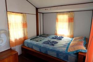 Voodi või voodid majutusasutuse Koh Mak Green View Resort toas