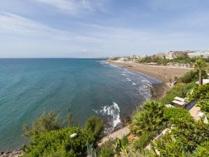 サンアグスティンにあるLas Adelfas South Beach 1 By CanariasGetawayのビーチと海の景色を望めます。