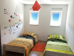 Ένα ή περισσότερα κρεβάτια σε δωμάτιο στο Franka