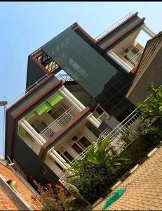 Φωτογραφία από το άλμπουμ του NYARUTARAMA APARTMENTS στο Κιγκάλι