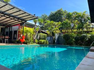 Bazén v ubytování ยูสีเกด รีสอร์ท nebo v jeho okolí