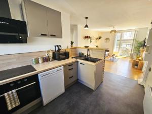 Køkken eller tekøkken på Le Bourget, Grand appartement proche du centre