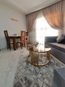 a living room with a couch and a table at Scandic Resort in Hurghada
