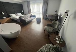 Postel nebo postele na pokoji v ubytování Hotel am Markt