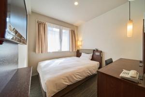 Voodi või voodid majutusasutuse Via inn Kyoto Shijomuromachi toas