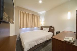 Voodi või voodid majutusasutuse Via inn Kyoto Shijomuromachi toas