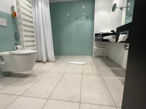 Koupelna v ubytování Hotel am Markt