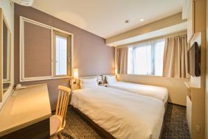 Voodi või voodid majutusasutuse Via inn Kyoto Shijomuromachi toas