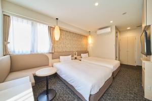 Voodi või voodid majutusasutuse Via inn Kyoto Shijomuromachi toas