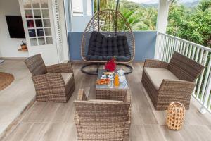 Posezení v ubytování Villa F4 chic avec jacuzzi en Martinique
