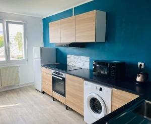 Kuchyň nebo kuchyňský kout v ubytování Happy Day-Appartement entier 2 chambres-60 m2
