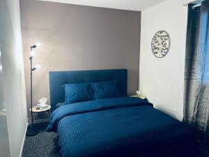 Postel nebo postele na pokoji v ubytování Happy Day-Appartement entier 2 chambres-60 m2 + 20 fotografií