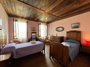 Postel nebo postele na pokoji v ubytování Ca' De Franceschi
