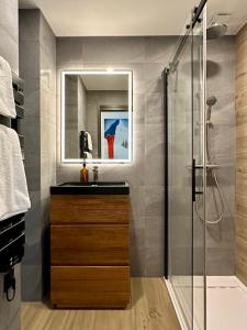 a bathroom with a sink and a shower at Mont-Blanc View - Panoramic Balcony - Chamonix Centre in Chamonix +32 photos