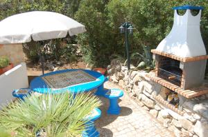 Utsikt över poolen vid Casa dos Amigos-cottage for 6 persons eller i närheten