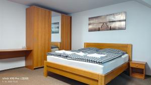 Letto o letti in una camera di Penzion YORK