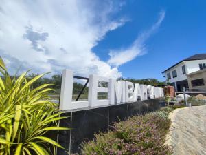 a sign for the entrance to a villa at Lembah Saerah Resort in Kangar