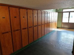 a row of lockers in a room with a window at Steph et Caro Studio Les Cassettes in Valloire