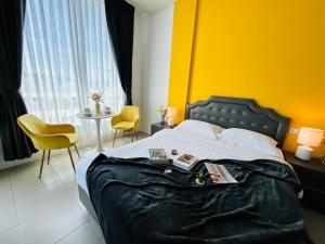 Postel nebo postele na pokoji v ubytování Studio room in Mango House