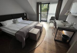 Postel nebo postele na pokoji v ubytování Hotel am Markt